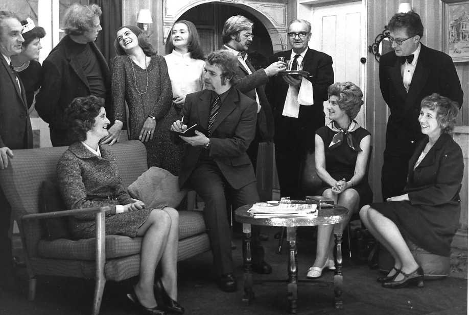 The Cast & Set Standing, left to right: Sid West ("Colquhoun"), Jacqueline Baskerville ("Doris"), Geoff Badham ("John"), Anita McNamara ("Veronica"), Dorothy Morris ("Henrietta"), Hugh Arnold ("Sir Henry"), Bill Payne ("Gudgeon"). Sitting, left to right: Brenda Jones ("Gerda"), Clive West ("DS Penny"), Margaret Lloyd ("Lady Angkatell").